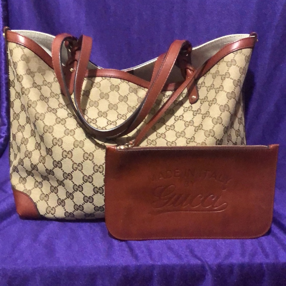 New Gucci Tote with attached leather pouch.